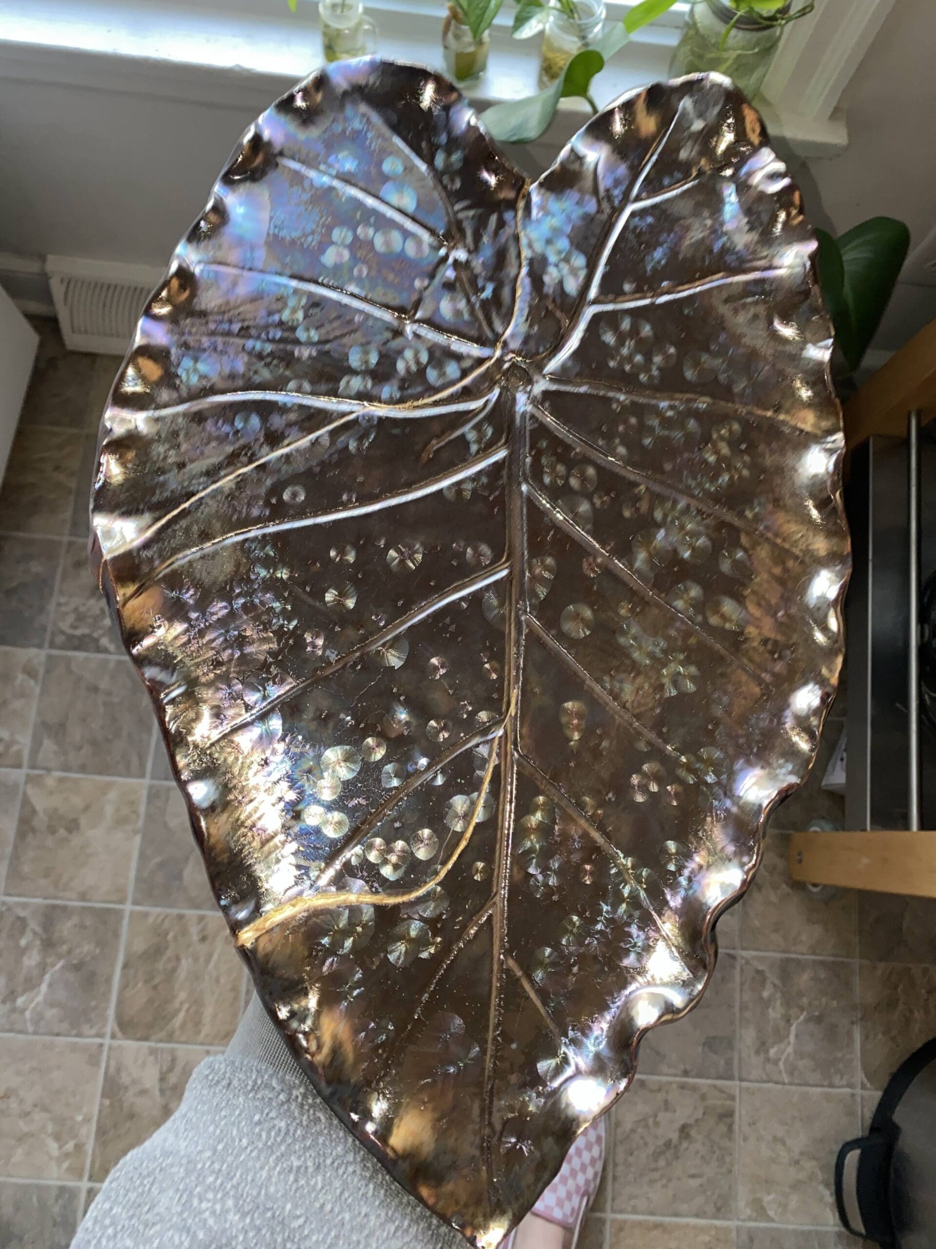 Gabrielle King’s favorite piece she’s created — an elephant ear platter that cracked during firing — was put back together with gold.